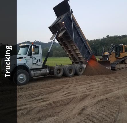 Dump trucking delivering aggregate | Trucking